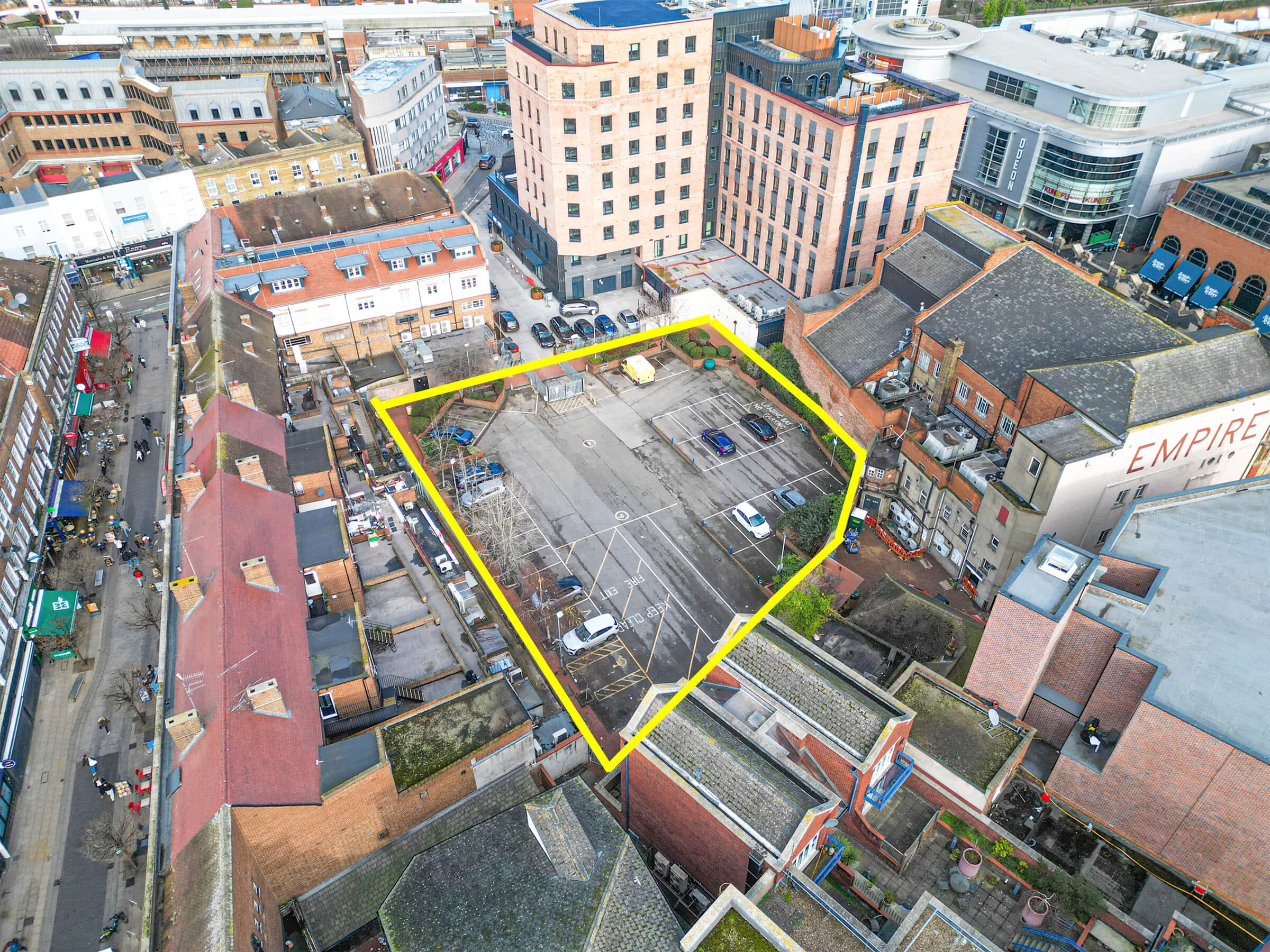 Aerial drone photograph of a property and its surrounding grounds.